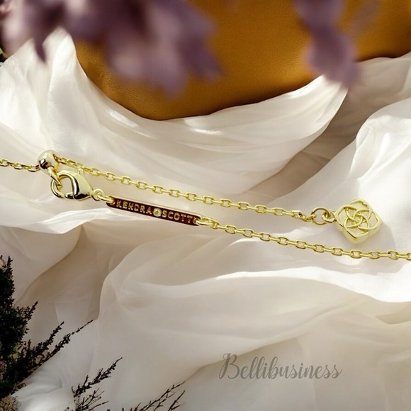 Kendra Scott Krista Gold Bow Short Pendant Necklace in White Mix - Picture 6 of 7